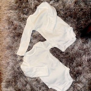 Two NB mitten onesies